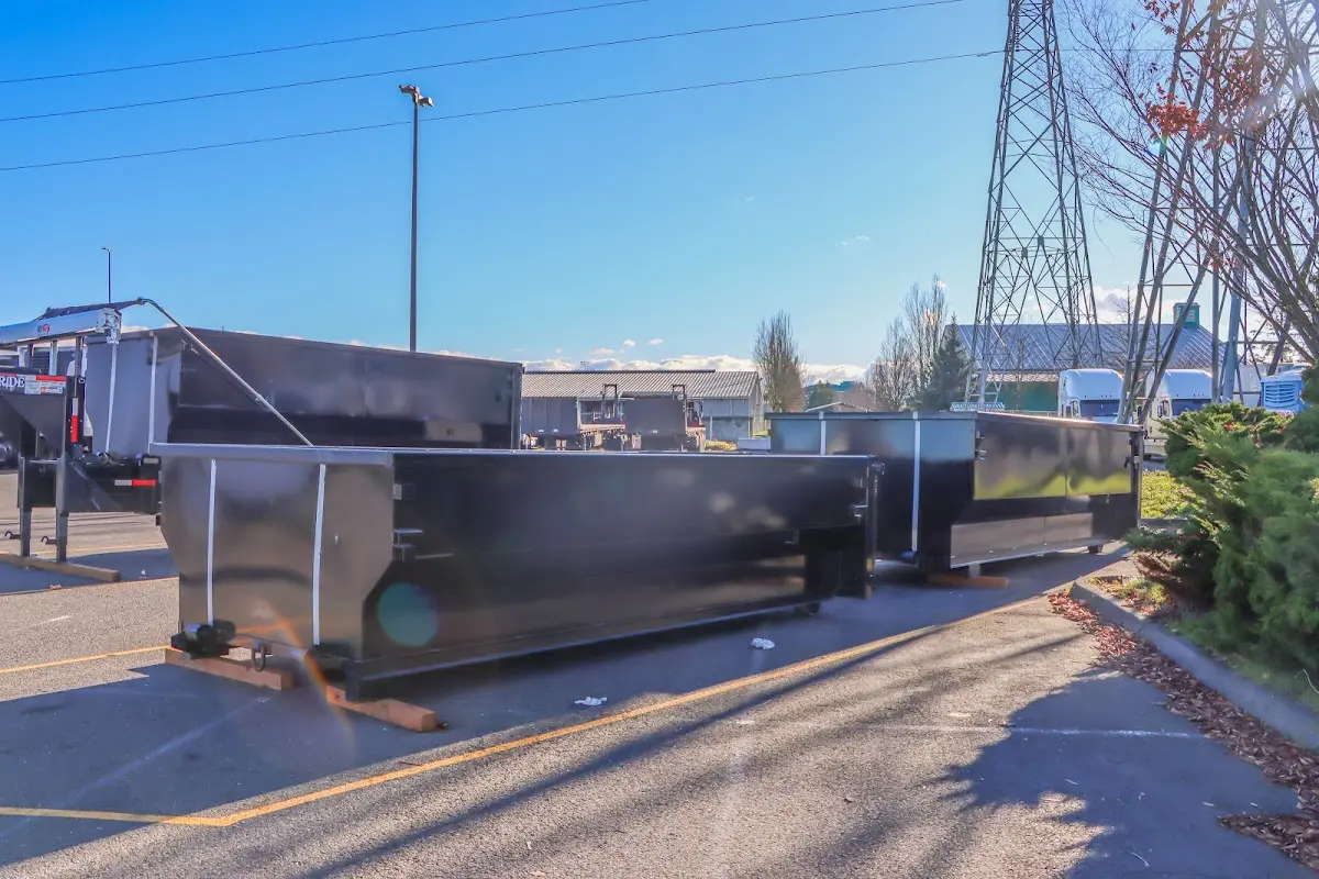 Roll-off dumpster ready for waste disposal at job site for 2 Yard Dumpster Rental in Monee